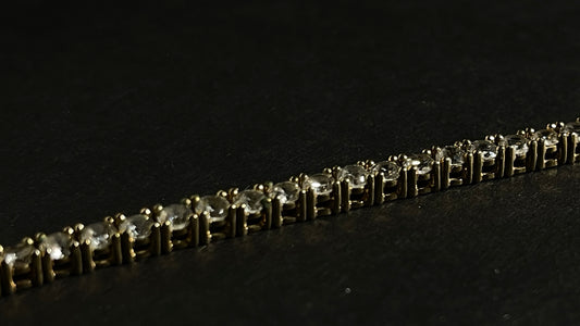 Dazzle and Shine: Elevate Your Style with our 18kt Gold Tennis Bracelet!