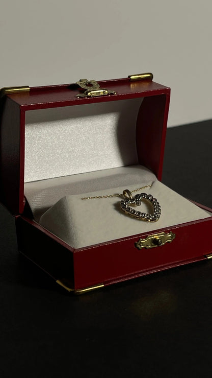 Adorn Yourself with the Grace of our 10k Gold Open Heart Pendant!